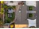An aerial view showcases the expansive yard, patio, garden and landscaping of the home at 11530 E Vine Ave, Mesa, AZ 85208