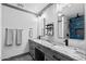 Bathroom featuring double sinks, granite countertops, and updated fixtures at 11530 E Vine Ave, Mesa, AZ 85208