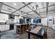 Modern kitchen flows into living space with large island, and stainless steel appliances at 11530 E Vine Ave, Mesa, AZ 85208