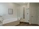 Modern bathroom featuring a soaking tub and glass-enclosed shower, creating a spa-like retreat at 11675 E Caron St, Scottsdale, AZ 85259