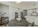 Dining area that shows the kitchen and stainless steel appliances at 11675 E Caron St, Scottsdale, AZ 85259