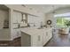 Bright kitchen showcases a center island with stainless steel appliances and an open floor plan at 11675 E Caron St, Scottsdale, AZ 85259