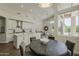 Kitchen features a breakfast area with a table, set beside a large bank of windows at 11675 E Caron St, Scottsdale, AZ 85259