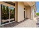 Open outdoor patio area with brick flooring, offering seamless indoor-outdoor living at 11675 E Caron St, Scottsdale, AZ 85259