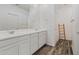 Bathroom boasting dual sinks with ample counter space and modern fixtures at 12416 W Midway Ave, Glendale, AZ 85307