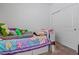 Cozy bedroom with twin bed and closet at 12416 W Midway Ave, Glendale, AZ 85307