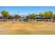 Community park and playground with walking paths, playground equipment, and green spaces, perfect for Gathering activities at 12416 W Midway Ave, Glendale, AZ 85307