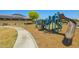Large community playground with slides, swings, and climbing equipment provides a fun and engaging space for  at 12416 W Midway Ave, Glendale, AZ 85307