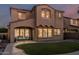 Beautiful home with covered patio overlooking a meticulously maintained artificial lawn at 13446 S 186Th Ave, Goodyear, AZ 85338