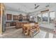 Spacious kitchen with wood cabinets, granite countertops, center island, and breakfast area at 13446 S 186Th Ave, Goodyear, AZ 85338