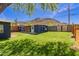 Spacious backyard with lush lawn, mature trees, and mountain views at 1527 E Sunnyslope Ln, Phoenix, AZ 85020