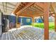 Backyard patio with a pergola, string lights, and gas water heater at 1527 E Sunnyslope Ln, Phoenix, AZ 85020