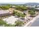 Aerial view of the community park featuring playground, basketball court, and walking paths at 15704 W Taylor St, Goodyear, AZ 85338