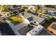 Aerial view of a house with lush lawn, RV parking, mature trees, and a sparkling pool at 1644 W Thunderbird Rd, Phoenix, AZ 85023
