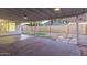 Back patio with brick and concrete textures under a covered awning provides room to enjoy the desert landscape at 1644 W Thunderbird Rd, Phoenix, AZ 85023