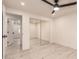 Bright bedroom features recessed lighting, ceiling fan, closet with mirrored doors, and wood-look flooring at 1644 W Thunderbird Rd, Phoenix, AZ 85023