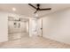 Bright bedroom has recessed lighting, a ceiling fan, closet with mirrored doors, and wood-look flooring at 1644 W Thunderbird Rd, Phoenix, AZ 85023