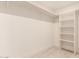 Functional closet with custom shelving providing ample storage space and a tidy design at 1644 W Thunderbird Rd, Phoenix, AZ 85023