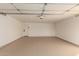 Spacious two car garage features bright walls and sealed concrete flooring at 1644 W Thunderbird Rd, Phoenix, AZ 85023