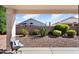 Charming backyard retreat with desert landscaping, creating a serene and low-maintenance outdoor space at 17611 W Ingleside Dr, Surprise, AZ 85374