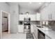 Well-lit kitchen featuring stainless steel appliances and stylish backsplash at 17611 W Ingleside Dr, Surprise, AZ 85374