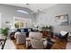 Bright living room with lots of seating options and natural light at 17611 W Ingleside Dr, Surprise, AZ 85374