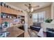 Bright office with built-in shelving, a large desk, and natural light at 17705 E Canyon Way, Gilbert, AZ 85298