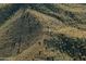 Aerial view of a beautiful community hiking trail winding through natural desert landscape at 1805 W Dusty Wren Dr, Phoenix, AZ 85085
