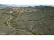 Scenic hiking trail amidst desert landscape, offering outdoor recreation opportunities within the community at 1805 W Dusty Wren Dr, Phoenix, AZ 85085