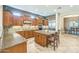 Well-equipped kitchen with stainless steel appliances, granite countertops, and ample cabinet space at 1805 W Dusty Wren Dr, Phoenix, AZ 85085