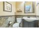 Beautiful powder room featuring elegant slate tile and modern fixtures at 1805 W Dusty Wren Dr, Phoenix, AZ 85085