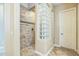 Modern shower showcasing stylish tile work and glass block accents at 1805 W Dusty Wren Dr, Phoenix, AZ 85085