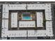Aerial view of a complex, featuring the pool and surrounding buildings in a courtyard arrangement at 18202 N Cave Creek Rd # 122, Phoenix, AZ 85032
