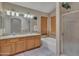 Bathroom ensuite features double sinks, tub, and separate glass shower at 18845 N 23Rd Pl, Phoenix, AZ 85024