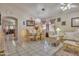 Inviting living area with tile flooring, a chandelier, and sophisticated décor, creating a welcoming atmosphere at 18845 N 23Rd Pl, Phoenix, AZ 85024