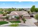 Expansive desert home featuring a tile roof, two car garage, and mature landscaping at 19902 S 190Th St, Queen Creek, AZ 85142