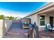 Backyard featuring a barbecue grill, outdoor seating, and a storage shed at 2070 E Saddlebrook Ct, Gilbert, AZ 85298