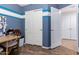 Bedroom features laminate flooring and closet with doors at 2070 E Saddlebrook Ct, Gilbert, AZ 85298