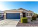 Charming single-Gathering home featuring a two-car garage and desert landscaping at 2070 E Saddlebrook Ct, Gilbert, AZ 85298