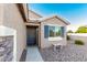 A welcoming home entrance featuring a decorative wreath and blue shutters at 2070 E Saddlebrook Ct, Gilbert, AZ 85298