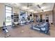 Community gym featuring cardio machines, free weights and expansive windows at 2070 E Saddlebrook Ct, Gilbert, AZ 85298