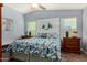 Comfortable main bedroom with a custom headboard and two bedside tables at 2070 E Saddlebrook Ct, Gilbert, AZ 85298
