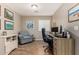 Home office with wood laminate flooring and a window with blinds at 2070 E Saddlebrook Ct, Gilbert, AZ 85298