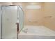 Relaxing bathroom showcases a large soaking tub and a separate glass door shower at 20900 N Vista Trl, Surprise, AZ 85387