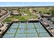 Aerial shot of active pickleball courts surrounded by a manicured golf course at 20900 N Vista Trl, Surprise, AZ 85387