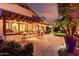 Outdoor space with a covered patio, bar seating, and built in grill at 2139 S Granite St, Gilbert, AZ 85295