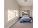 Bedroom with a blue comforter set and window view at 2139 S Granite St, Gilbert, AZ 85295