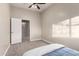 Bedroom with neutral walls and carpet, plus a ceiling fan at 2139 S Granite St, Gilbert, AZ 85295