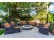 Inviting backyard fire pit area featuring comfortable seating, perfect for outdoor entertaining and relaxing evenings at 2139 S Granite St, Gilbert, AZ 85295