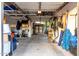 Spacious garage with overhead storage racks offering ample parking and storage at 2139 S Granite St, Gilbert, AZ 85295